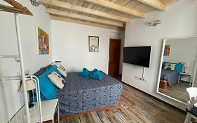 Casa pescado, madera y sol